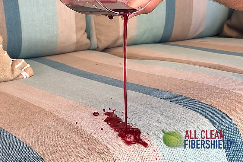 wine on sofa protected with FiberShield®